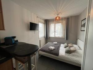 Appartements Meres YourHostHelper : photos des chambres