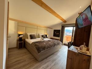 Appartements Les Trois Chaufatons - Chalets Boutiques, Proprietes Mont Amour : photos des chambres