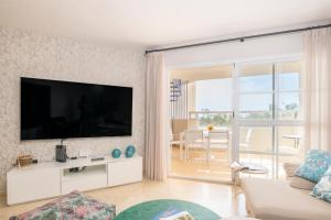 Apartamento con piscina, golf y solarium by Rent Me