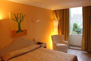 Hotels Hotel Les Palmiers : photos des chambres