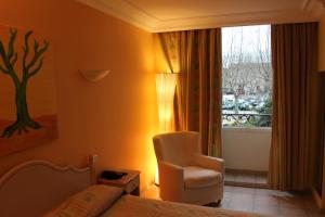Hotels Hotel Les Palmiers : photos des chambres
