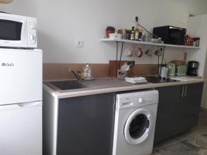 Appartements Cosy T1 BIS - Centre ville : photos des chambres