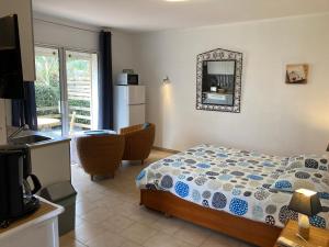 Maisons de vacances Les Bougainvillees de Camargue : photos des chambres