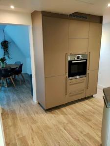 Appartements Au pied du Chateau : photos des chambres