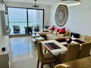 Front beach apartment close to the Cartagena letters