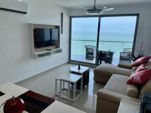 Front beach apartment close to the Cartagena letters