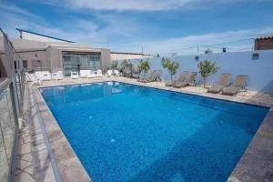 סוויטות כחול לבן - בקתות וסוויטות מושלמות עם ג'קוזי פרטי ובריכה מחוממת במתחם - Tsiv'on