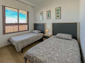 Bianca Beach 222 - Mil Palmeras, vista piscina y mar