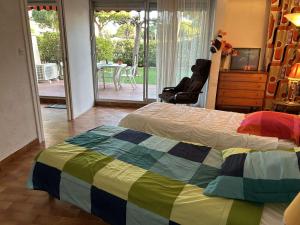 Appartement T2 6 couchages avec jardin privé et terrasse au Grau-du-Roi, à deux pas de la mer - FR-1-250-223