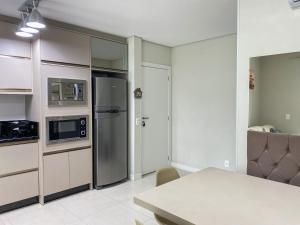 Apartamento encantador com piscina na Praia de Palmas Governador Celso Ramos