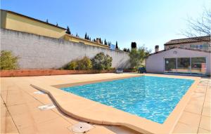 Maisons de vacances Beautiful home in Vendemian with Outdoor swimming pool, Heated swimming pool and 5 Bedrooms : photos des chambres