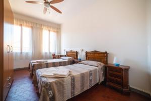 Twin Room with Shared Bathroom room in Ostello Domus Civica