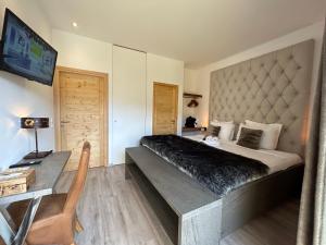 Appartements Les Trois Chaufatons - Chalets Boutiques, Proprietes Mont Amour : photos des chambres