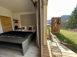 Appartements Les Trois Chaufatons - Chalets Boutiques, Proprietes Mont Amour : photos des chambres