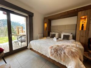 Appartements Les Trois Chaufatons - Chalets Boutiques, Proprietes Mont Amour : photos des chambres