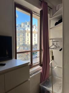 Appartements Magnifique studio cosy en plein coeur de Paris! : photos des chambres