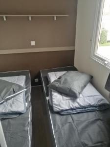 Campings MHVACANCES LOUENT PLUSIEURS MOBILHOMES DANS CAMPING 4 ETOILES PROCHE CHATEAUX et ZOO BEAUVAL : photos des chambres