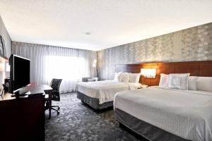 Queen Room with Two Queen Beds room in Courtyard by Marriott Jacksonville Airport/ Northeast