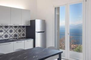 Villa Malù - APT Mara - Piscina e vista lago