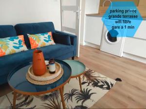 Appartements Le st caprais * parking* wifi* : photos des chambres