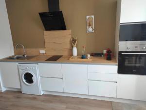 Appartements Le st caprais * parking* wifi* : photos des chambres