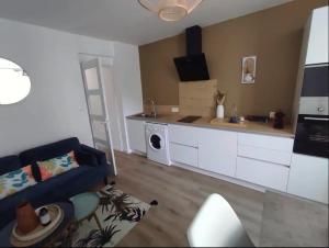 Appartements Le st caprais * parking* wifi* : photos des chambres