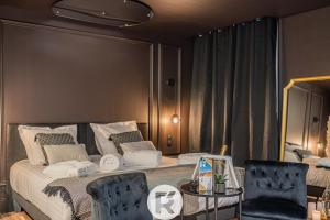 Appartements R'Apparts The Love Nest Suite : photos des chambres