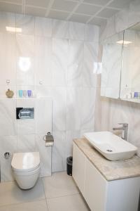 ONLY ONE Suites & Residences