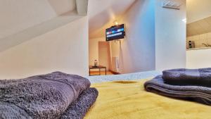 Appartements Studio ONE - Musee Auto - Wifi - RBNB : photos des chambres