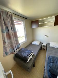 Campings Team Holiday - Camping du Petit Pont : photos des chambres