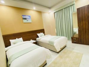 Summit Hotel Suites - القمة للأجنحة الفندقيه