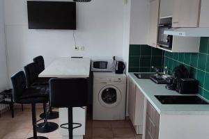 Appartements Appartement face a la Gare : photos des chambres