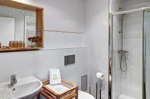 4 Arts Apartments by Adrez