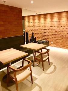 Quarto Executivo para Sua Estadia de Trabalho