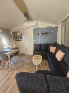 Campings Mobil home Sylvie et Alain : photos des chambres