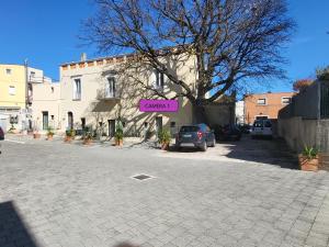 Le Dimore nel Cortile con patio e parcheggio privato