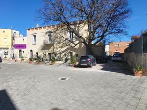 Le Dimore nel Cortile con patio e parcheggio privato