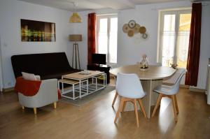 Appartements L'escapade - Logement les pieds dans l'eau a Luc : photos des chambres