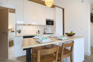 Appartements L'Ethnique 6p - Climatisation - Jardin - Parking - Salle de Sport : photos des chambres