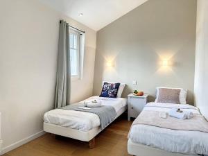 Villas La Villa Carat - YourHostHelper : photos des chambres