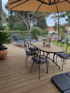 Appartements Maisonnette neuve plage et commerces a pied : photos des chambres