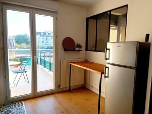 Appartements LE COSY plein centre avec terrasse : photos des chambres