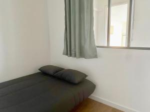 Appartements LE COLORADO, P2 cosy en plein coeur de ville, Wifi et climatisation : photos des chambres