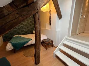 Appartements *La douce etape des Chateaux * : photos des chambres