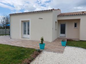 Maisons de vacances La Janne - Maison avec jardin : photos des chambres