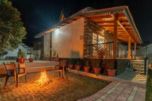 SaffronStays Kurmavana, Bhimtal - luxury cottage with pool and lawn -clear roads