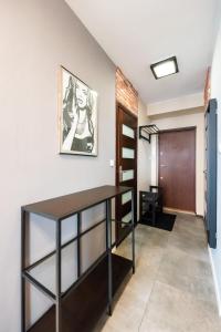 Ratusz Arsenał Modern City Apartment by BookingHost