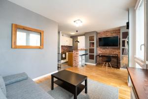 Ratusz Arsenał Modern City Apartment by BookingHost