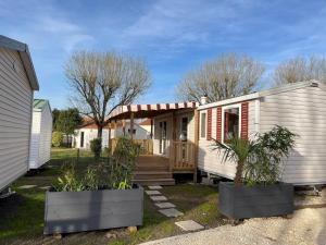 Campings Team Holiday - Camping du Petit Pont : photos des chambres