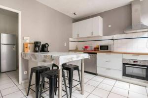 Appartements Cosy Maison de ville 100m2 - tout equipee et calme : photos des chambres